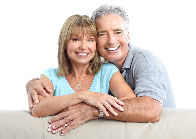 Senior Happy Couple With Dental Implants From Springs Dental